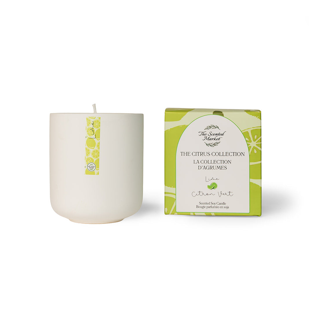 White candle with a green box labeled 'The Citrus Collection' on a white background